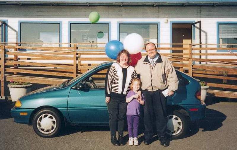 Maureen, Shawna and Jim with Mo's "new" 94' Ford Aspire